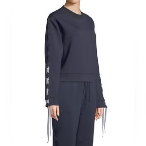 Nylora Darcy Activewear Sweatshirt Top with Lace-Up Sleeves. Navy. Size Large